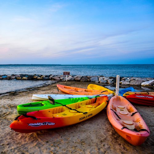 Kayaks On Beach